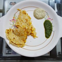 A picture of Corn stuffed dosa.