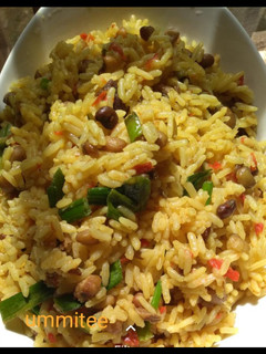 A picture of Jollof rice and beans.