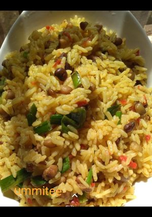 A picture of Jollof rice and beans.