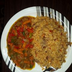 A picture of Arabian rice and curry soup.
