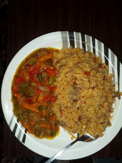 A picture of Arabian rice and curry soup.