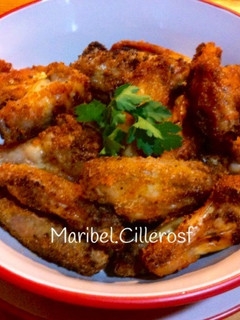 Una foto de Alitas de pollo especiadas, en freidora sin aceite