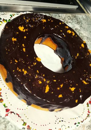 Una foto de Bizcocho de Naranja con Cobertura de Chocolate Negro