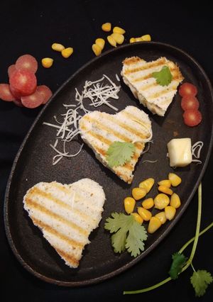 A picture of Corn potato cheese sandwich.