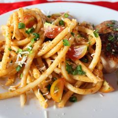 A picture of Pan fried chicken breast & Minced meat spaghetti.