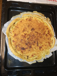 Una foto de Quiche de cebolla y bacon