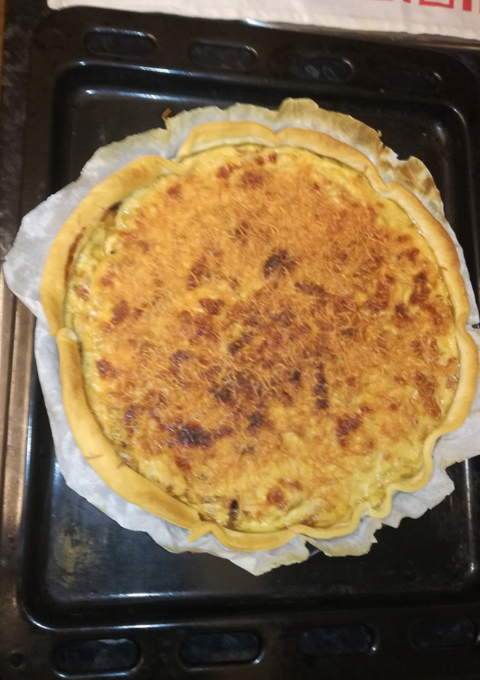 Una foto de Quiche de cebolla y bacon