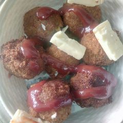 A picture of Chesse nuggets.