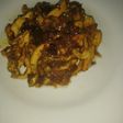 Pechuga de pollo en juliana con cebolla caramelizada