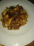 Pechuga de pollo en juliana con cebolla caramelizada