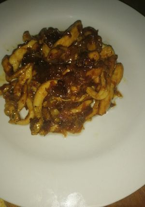 Una foto de Pechuga de pollo en juliana con cebolla caramelizada