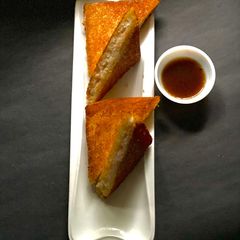 A picture of Hatoshi, Japanese Shrimp Toast (crispy fritter) with Yuzu Sauce.