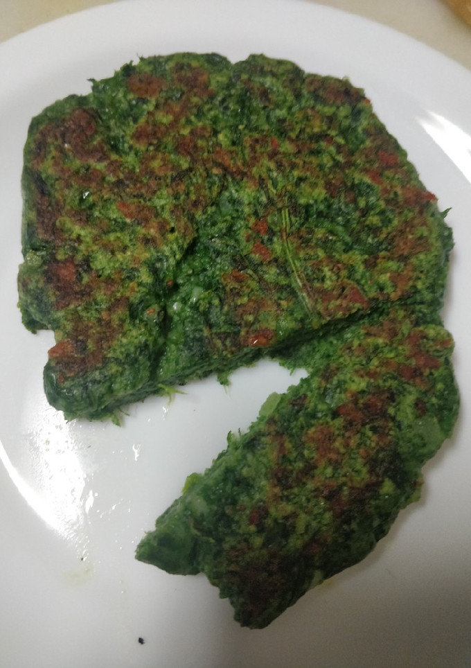 Una foto de Hamburguesa de espinacas y cebolla