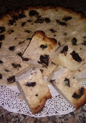 Una foto de Tarta de ricota y ciruelas