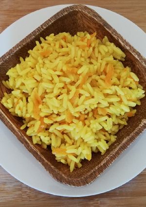 Una foto de Arroz al curry con zanahoria
