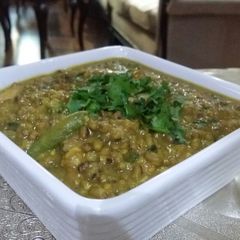 A picture of Moong daal with chicken.