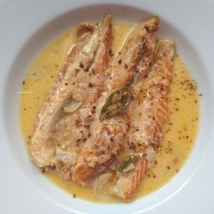 A picture of Salmon fins in cream.