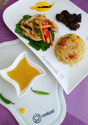A picture of Teriyaki rice, chicken salad with honey and orange dressing.