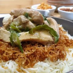 A picture of Ginger Chicken with Crispy Noodles & Garlic Rice.
