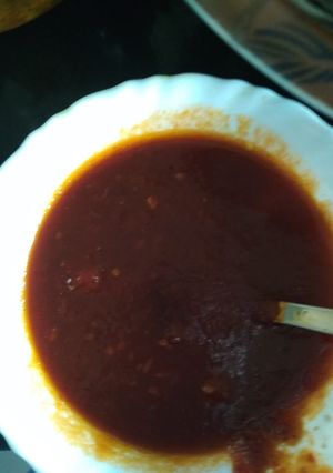 A picture of Tomato chutney with jaggery.