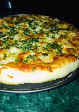 A picture of Herby Prawn Pizza 🍤 🍕 🌿.