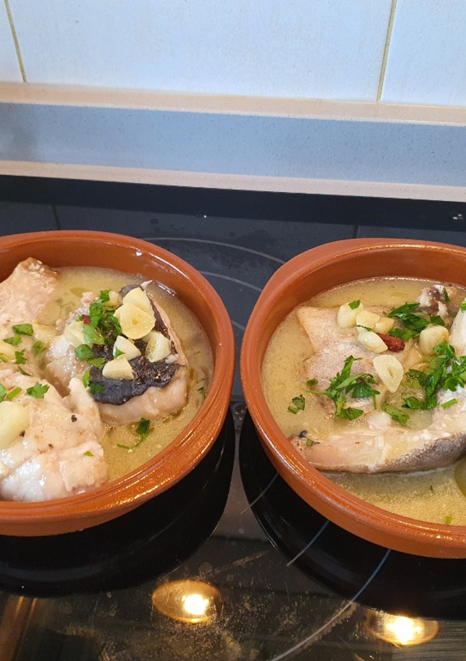 Una foto de Bacalao al pil pil
