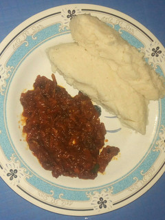 A picture of Ugali with fried fish curry.