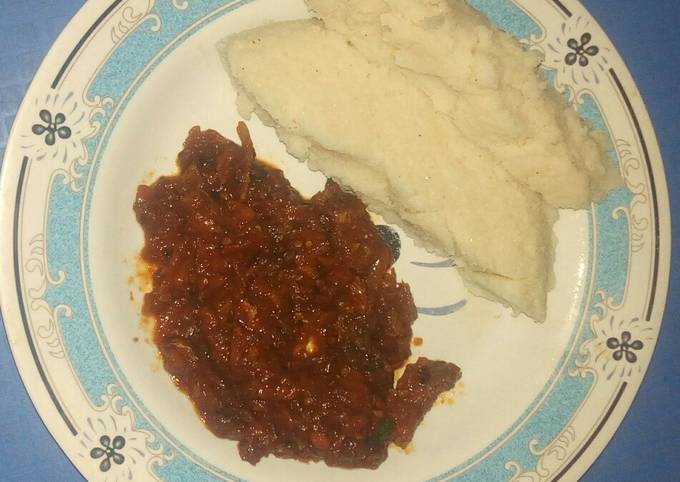 Ugali with fried fish curry