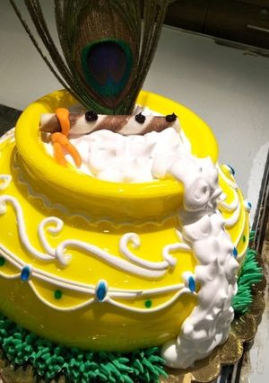 A picture of Janmashtami matak cake.