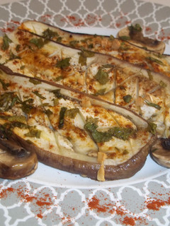 Una foto de Berenjenas y champiñones al horno