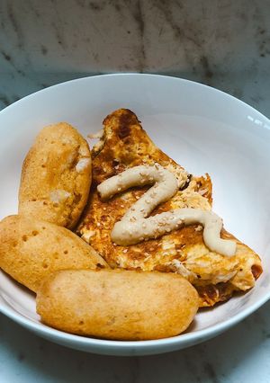 Una foto de Carimañolas con omelette de pollo desmechado