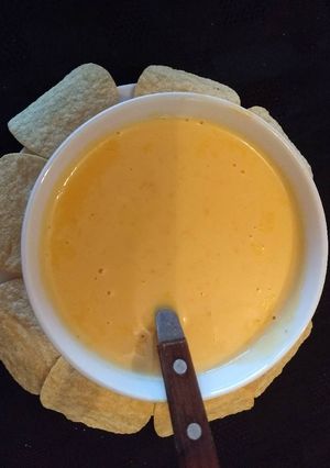 Una foto de Salsa de queso cheddar para nachos
