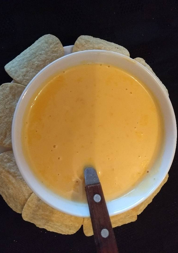 Una foto de Salsa de queso cheddar para nachos