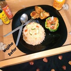A picture of Peri Peri Chicken with Portuguese Spice Rice n Salsa.