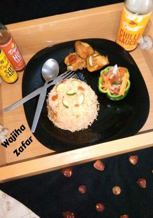 A picture of Peri Peri Chicken with Portuguese Spice Rice n Salsa.