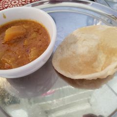Dahi vale aloo with supersoft puri A picture of Dahi vale aloo with supersoft puri.