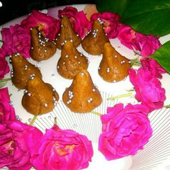 Biscuits modak with tutifruti filling A picture of Biscuits modak with tutifruti filling.