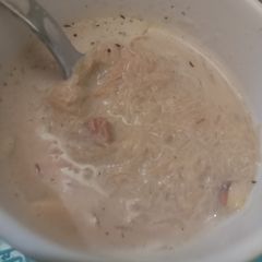 A picture of Dry fruit Fennia with Milk tea.