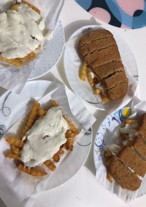 صورة لوصفة دجاج مقرمش بصوص الباشميل والبطاطس بطريقتي