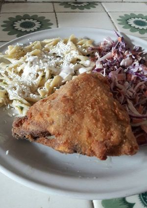 Una foto de Pollo tipo kentucky