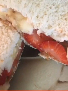 A picture of Cookies and strawberry banana sandwich.