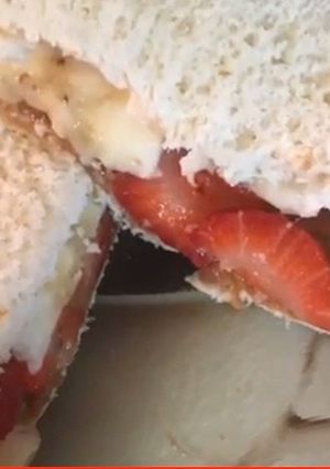 A picture of Cookies and strawberry banana sandwich.