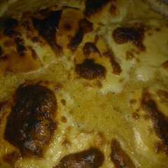 A picture of Tarta casera de choclo y queso crema.