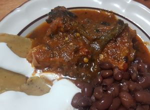 Una foto de Carne de puerco con rajitas