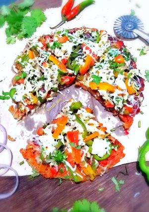 चावल का पिज़्ज़ा (chawal ka pizza recipe in Hindi) रेसिपी मुख्य फोटो