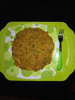 A picture of Beans with smoked mackerel and sausage and veggies.