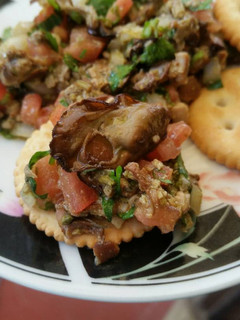 Una foto de Ensalada de ostiones ahumados