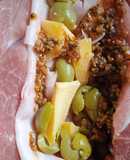 Bondiola Rellena de Jamón, queso, chimichurri y aceitunas