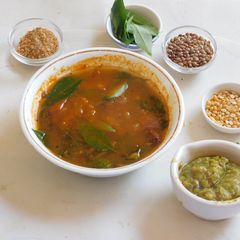 A picture of AROMATIC SPICY FLAVORFUL HEALTHY RASAM /SOUP WITH HORSE GRAM AND TOMATOES.