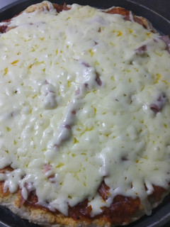 Una foto de Pizza de masa integral